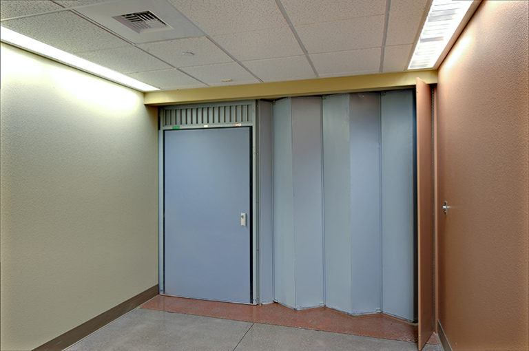 CASE 2 Side Acting Accordion with Complying Swing Egress Door McKEON